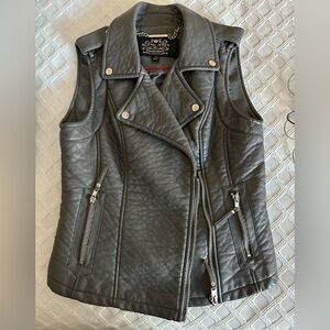 Women’s motor vest used one time.